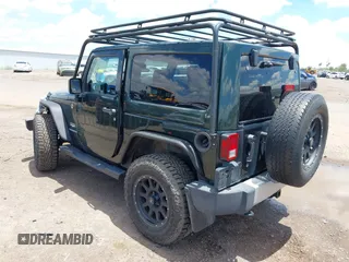2012 Jeep Wrangler Sahara z VIN 1C4AJWBGXCL100527, wystawiony jako IAAI lot #42394623 z przebiegiem 126 097 mil mil oraz . Historia ofert i sprzedaży dostępna na DreamBid. Obrazek 3.
