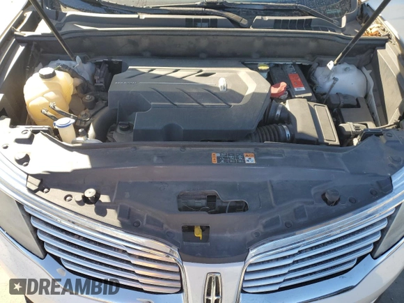 2016 Lincoln MKX Reserve z VIN 2LMPJ6LP7GBL54002, wystawiony jako Copart lot #48757875 z przebiegiem 128 008 mil mil oraz Szkoda całkowita • Salvage title. Historia ofert i sprzedaży dostępna na DreamBid. Obrazek 11.
