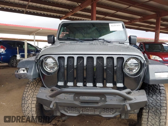 2020 Jeep Wrangler Unlimited Black and Tan с VIN 1C4HJXDG3LW266615, выставлен на аукционе IAAI как лот 42207899 с пробегом 55 291 миль миль и . История ставок и продаж доступна на DreamBid. Изображение 12.