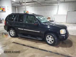 2003 GMC Envoy SLT with VIN 1GKDT13S232251871, listed as a Copart auction lot 45306785 with 174,303 mi miles and Salvage Title. Bid and sale history available at carsss.com. Image 4.