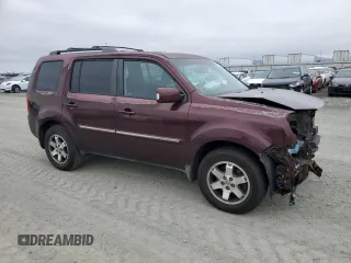 2011 Honda Pilot Touring z VIN 5FNYF3H92BB039165, wystawiony jako Copart lot #59596105 z przebiegiem 182 944 mil mil oraz Szkoda całkowita • Salvage title. Historia ofert i sprzedaży dostępna na DreamBid. Obrazek 4.