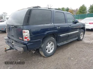 2005 GMC Yukon SLT with VIN 1GKEC13T45J139885, listed as a IAAI auction lot 41796394 with 229,494 mi miles. Bid and sale history available at carsss.com. Image 4.