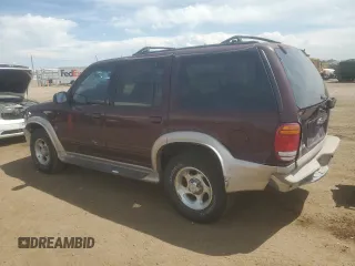 2000 Ford Explorer Eddie Bauer с VIN 1FMDU84P3YZA71207, выставлен на аукционе Copart как лот 58270915 с пробегом 188 096 миль миль и Списание • Salvage title. История ставок и продаж доступна на DreamBid. Изображение 2.