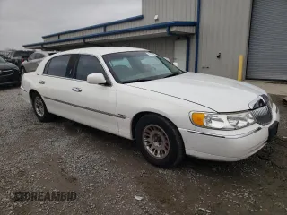 2001 Lincoln Town Car Cartier L z VIN 1LNHM85W11Y610538, wystawiony jako Copart lot #47881055 z przebiegiem 139 032 mil mil oraz Szkoda całkowita • Salvage title. Historia ofert i sprzedaży dostępna na DreamBid. Obrazek 4.