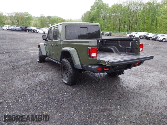 2023 Jeep Gladiator Mojave with VIN 1C6JJTEG6PL564504, listed as a IAAI auction lot 41752685 with 20,430 mi miles and . Bid and sale history available at DreamBid. Image 3.