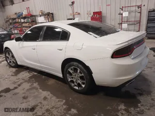 2016 Dodge Charger SXT with VIN 2C3CDXJG6GH282127, listed as a IAAI auction lot 41591877 with 82,331 mi miles. Bid and sale history available at carsss.com. Image 3.