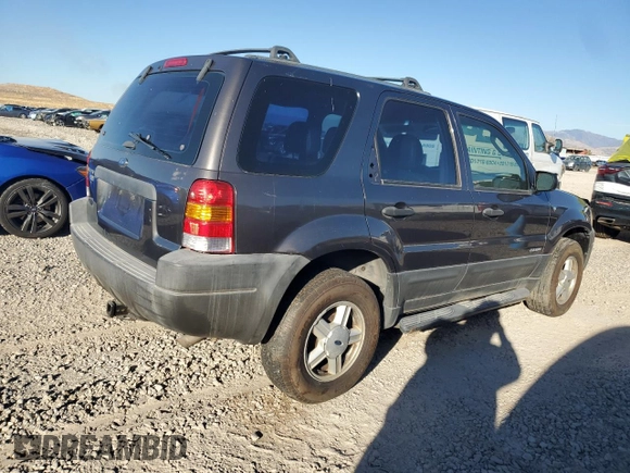 2002 Ford Escape XLS Choice with VIN 1FMYU021X2KC77142, listed as a Copart auction lot 77036384 with 213,292 mi miles and Clean title. Bid and sale history available at DreamBid. Image 3.