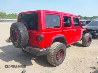 2022 Jeep Wrangler Unlimited Rubicon with VIN 1C4HJXFG0NW100620, listed as a IAAI auction lot 42534993 with 21,614 mi miles and . Bid and sale history available at DreamBid. Image 4.