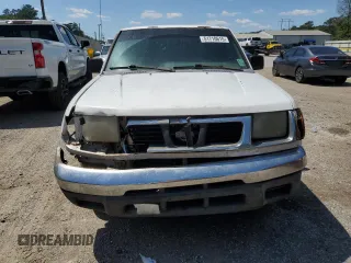1999 Nissan Frontier XE with VIN 1N6DD26S3XC326231, listed as a Copart auction lot 51710615 with 228,174 mi miles and Salvage title. Bid and sale history available at DreamBid. Image 5.
