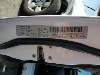 2018 Ram 1500 SLT z VIN 1C6RR6GG1JS317639, wystawiony jako Copart lot #83449814 z przebiegiem 103 022 mil mil oraz Szkoda całkowita • Salvage title. Historia ofert i sprzedaży dostępna na DreamBid. Obrazek 12.