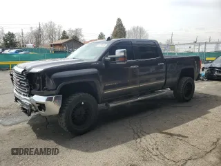 2015 GMC Sierra 2500HD SLT z VIN 1GT12ZE85FF589148, wystawiony jako Copart lot #51329515 z przebiegiem 194 378 mil mil oraz Szkoda całkowita • Salvage title. Historia ofert i sprzedaży dostępna na DreamBid. Obrazek 1.