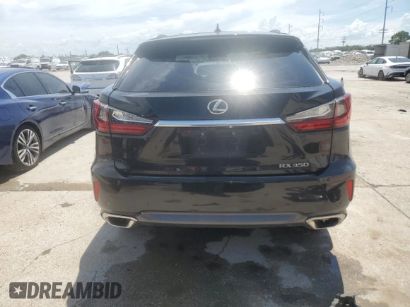 2016 Lexus RX 350 with VIN 2T2ZZMCA7GC012103, listed as a Copart auction lot 62763585 with 297,427 mi miles and Salvage title. Bid and sale history available at DreamBid. Image 6.