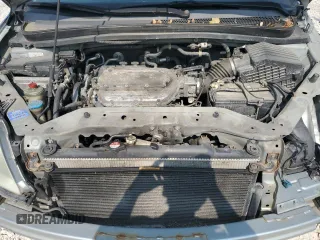 2010 Honda Odyssey EX-L z VIN 5FNRL3H74AB034608, wystawiony jako Copart lot #59262505 z przebiegiem 243 186 mil mil oraz Szkoda całkowita • Salvage title. Historia ofert i sprzedaży dostępna na DreamBid. Obrazek 12.