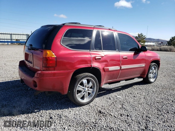 2004 GMC Envoy SLT with VIN 1GKDT13S242417226, listed as a Copart auction lot 46111865 with 375,450 mi miles and Salvage Title. Bid and sale history available at DreamBid. Image 3.