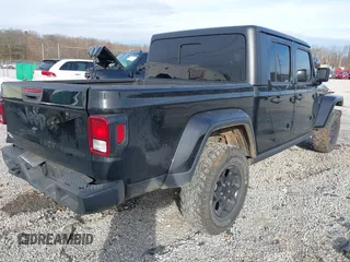 2023 Jeep Gladiator Sport S z VIN 1C6HJTAG7PL567903, wystawiony jako IAAI lot #41574387 z przebiegiem 49 378 mil mil oraz . Historia ofert i sprzedaży dostępna na DreamBid. Obrazek 4.