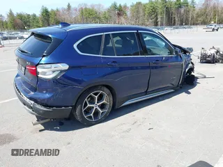 2017 BMW X1 xDrive28i with VIN WBXHT3C39H5F71525, listed as a IAAI auction lot 42050272 with 118,875 mi miles. Bid and sale history available at carsss.com. Image 4.