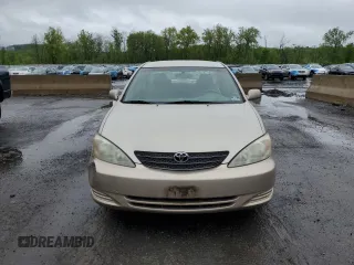 2002 Toyota Camry LE z VIN 4T1BE32K42U623283, wystawiony jako Copart lot #55631065 z przebiegiem 96 830 mil mil oraz Szkoda całkowita • Salvage title. Historia ofert i sprzedaży dostępna na DreamBid. Obrazek 5.