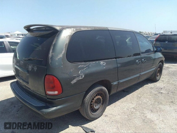 2000 Dodge Caravan SE with VIN 2B4GP44G9YR629814, listed as a IAAI auction lot 37525321 with Not provided miles and . Bid and sale history available at DreamBid. Image 4.