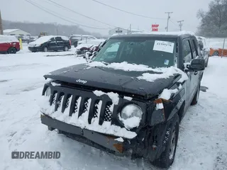 2014 Jeep Patriot Sport with VIN 1C4NJRBB2ED841808, listed as a IAAI auction lot 41595178 with 146,323 mi miles and . Bid and sale history available at DreamBid. Image 2.