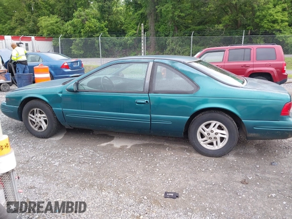 1996 Ford Thunderbird LX z VIN 1FALP62W9TH118637, wystawiony jako IAAI lot #42311641 z przebiegiem 96 361 mil mil oraz . Historia ofert i sprzedaży dostępna na DreamBid. Obrazek 14.