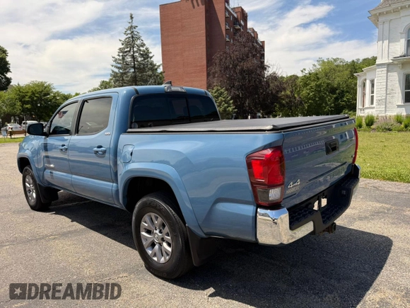2019 Toyota Tacoma SR with VIN 3TMCZ5AN8KM272578, listed as a Copart auction lot 63283405 with 79,569 mi miles and Clean title. Bid and sale history available at DreamBid. Image 3.