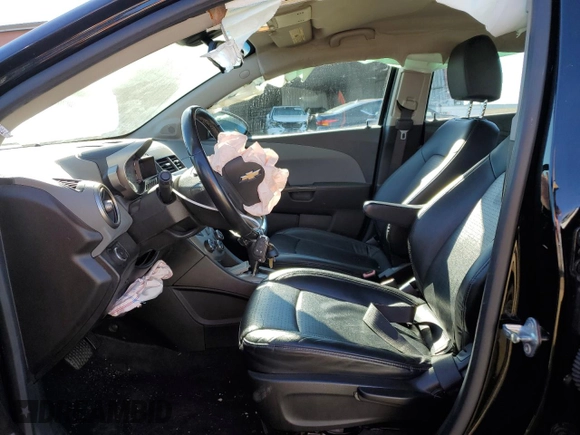2012 Chevrolet Sonic LTZ z VIN 1G1JE6SH5C4195594, wystawiony jako Copart lot #88336435 z przebiegiem 105 112 mil mil oraz Szkoda całkowita • Salvage title. Historia ofert i sprzedaży dostępna na DreamBid. Obrazek 7.