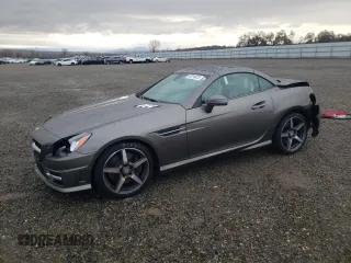 2015 Mercedes-Benz SLK-Class SLK 250 with VIN WDDPK4HA0FF103105, listed as a Copart auction lot 70014972 with 27,058 mi miles. Bid and sale history available at carsss.com. Image 1.