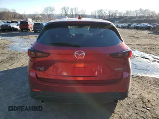 2023 Mazda CX-5 S Select with VIN JM3KFBBM1P0252294, listed as a Copart auction lot 84537504 with 27,206 mi miles and Salvage Title. Bid and sale history available at DreamBid. Image 6.
