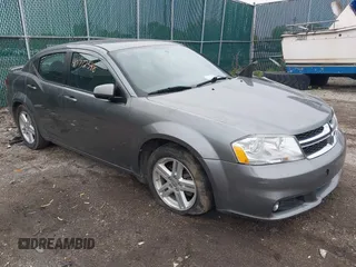 2013 Dodge Avenger SXT z VIN 1C3CDZCG0DN521540, wystawiony jako IAAI lot #40772548 z przebiegiem 145 455 mil mil oraz . Historia ofert i sprzedaży dostępna na DreamBid. Obrazek 1.