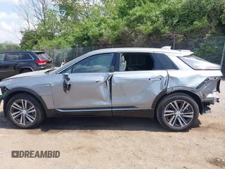 2024 Cadillac LYRIQ Luxury z VIN 1GYKPRRL8RZ128706, wystawiony jako IAAI lot #42161670 z przebiegiem 12 258 mil mil oraz . Historia ofert i sprzedaży dostępna na DreamBid. Obrazek 15.