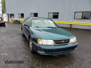 1998 Toyota Avalon XL with VIN 4T1BF18B6WU242906, listed as a Copart auction lot 52385935 with 108,802 mi miles and Salvage Title. Bid and sale history available at DreamBid. Image 10.