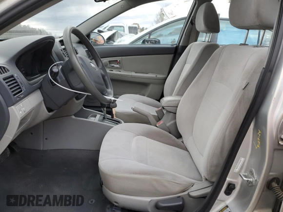 2009 Kia Spectra EX with VIN KNAFE221195655309, listed as a Copart auction lot 46620985 with 105,607 mi miles and Salvage Title. Bid and sale history available at DreamBid. Image 7.