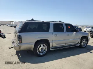 2006 GMC Yukon XL with VIN 1GKFK66U36J134459, listed as a Copart auction lot 55802165 with 277,366 mi miles and Salvage title. Bid and sale history available at DreamBid. Image 3.