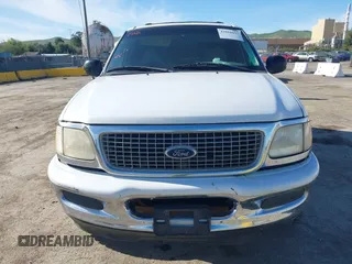 1999 Ford Expedition XLT z VIN 1FMPU18L0XLB52467, wystawiony jako IAAI lot #42018037 z przebiegiem 288 327 mil mil oraz . Historia ofert i sprzedaży dostępna na DreamBid. Obrazek 6.