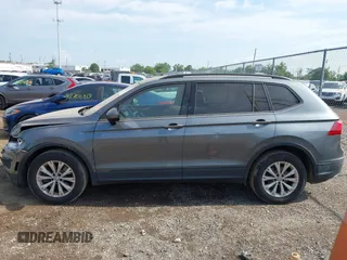 2018 Volkswagen Tiguan S with VIN 3VV0B7AX5JM108306, listed as a IAAI auction lot 42741783 with 71,040 mi miles and . Bid and sale history available at DreamBid. Image 14.