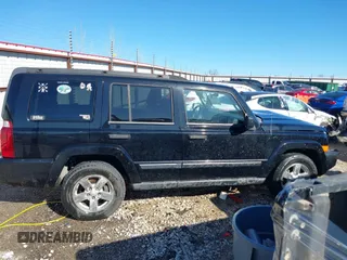 2006 Jeep Commander with VIN 1J8HG48N66C174256, listed as a IAAI auction lot 41652107 with 106,966 mi miles. Bid and sale history available at carsss.com. Image 14.