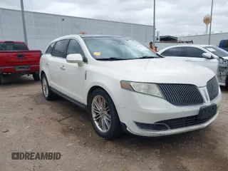 2013 Lincoln MKT EcoBoost with VIN 2LMHJ5AT6DBL57810, listed as a IAAI auction lot 41753767 with 159,890 mi miles. Bid and sale history available at carsss.com. Image 1.