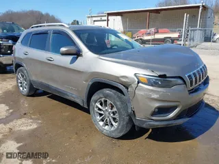 2020 Jeep Cherokee Latitude Plus with VIN 1C4PJMLBXLD551002, listed as a IAAI auction lot 41728153 with 57,038 mi miles. Bid and sale history available at carsss.com. Image 1.