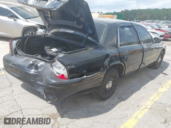 2004 Ford Police Interceptor Base w/3.27 Axle with VIN 2FAFP71W34X136279, listed as a IAAI auction lot 41945086 with 151,350 mi miles and . Bid and sale history available at DreamBid. Image 4.