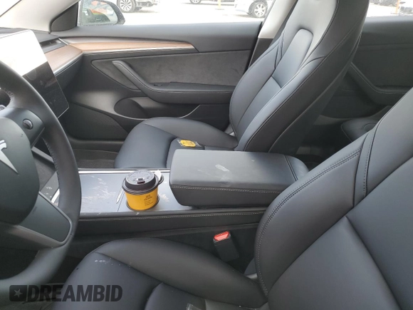 2023 Tesla Model 3 с VIN 5YJ3E1EA9PF482498, выставлен на аукционе Copart как лот 48426165 с пробегом Не указан миль и Списание • Salvage title. История ставок и продаж доступна на DreamBid. Изображение 7.