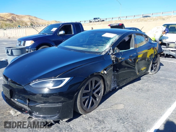 2022 Tesla Model S with VIN 5YJSA1E52NF476906, listed as a IAAI auction lot 41320074 with Not Provided miles and . Bid and sale history available at DreamBid. Image 18.