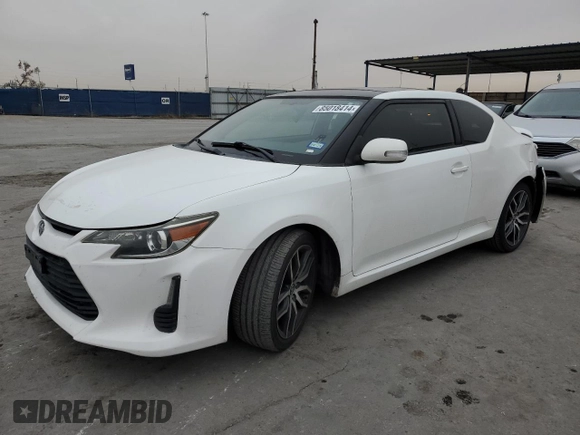 2014 Scion tC z VIN JTKJF5C7XE3079538, wystawiony jako Copart lot #85018414 z przebiegiem 136 905 mil mil oraz Czysty tytuł • Clean title. Historia ofert i sprzedaży dostępna na DreamBid. Obrazek 1.