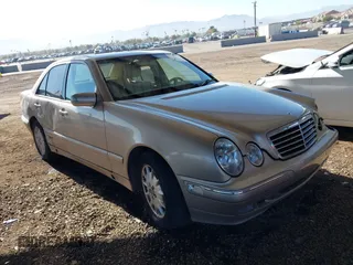 2001 Mercedes-Benz E-Class with VIN WDBJF65J11B232599, listed as a IAAI auction lot 41517879 with 173,366 mi miles. Bid and sale history available at carsss.com. Image 1.