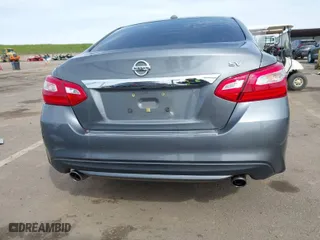 2017 Nissan Altima 2.5 SV with VIN 1N4AL3AP0HC123211, listed as a IAAI auction lot 41842162 with 106,389 mi miles. Bid and sale history available at carsss.com. Image 16.