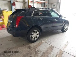 2016 Cadillac SRX Luxury Collection z VIN 3GYFNEE38GS565721, wystawiony jako IAAI lot #41963005 z przebiegiem 87 005 mil mil oraz . Historia ofert i sprzedaży dostępna na DreamBid. Obrazek 4.