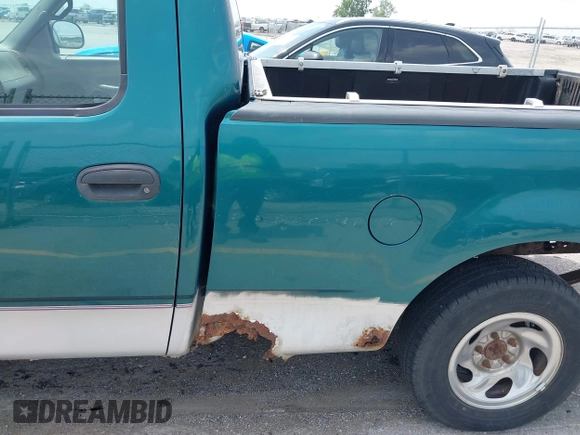 1997 Ford F-150 with VIN 1FTDF1722VNB40056, listed as a IAAI auction lot 42502044 with 155,836 mi miles and . Bid and sale history available at DreamBid. Image 13.