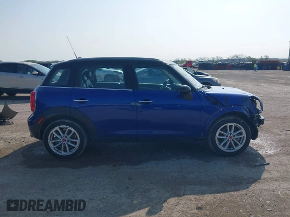 2015 MINI Countryman with VIN WMWZB3C56FWR43443, listed as a IAAI auction lot 41920848 with 91,192 mi miles and . Bid and sale history available at DreamBid. Image 14.