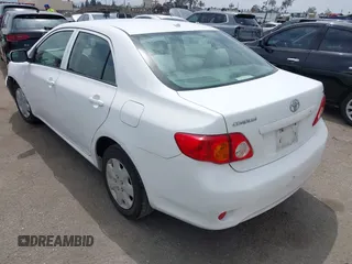 2010 Toyota Corolla with VIN JTDBU4EE6AJ063009, listed as a IAAI auction lot 42034688 with 168,643 mi miles. Bid and sale history available at carsss.com. Image 3.