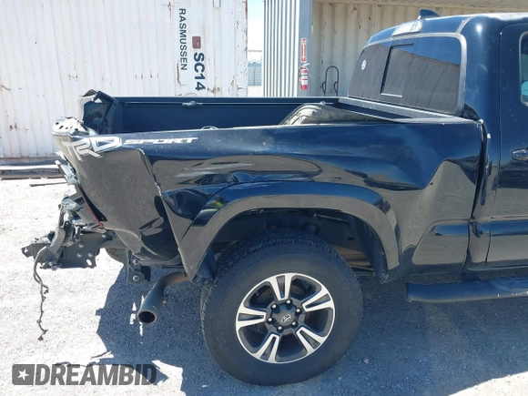 2018 Toyota Tacoma SR5 with VIN 3TMBZ5DN1JM014540, listed as a IAAI auction lot 42505324 with 112,990 mi miles and . Bid and sale history available at DreamBid. Image 6.