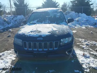 2015 Jeep Compass Latitude with VIN 1C4NJDEB6FD217056, listed as a IAAI auction lot 41269105 with 152,403 mi miles. Bid and sale history available at carsss.com. Image 12.